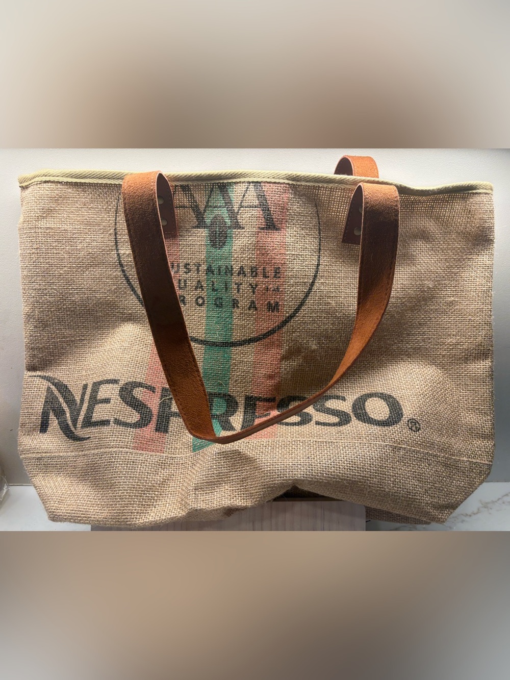 Nespresso Burlap Duffel Bag with Brown Leather Straps and Green/Red Stripes